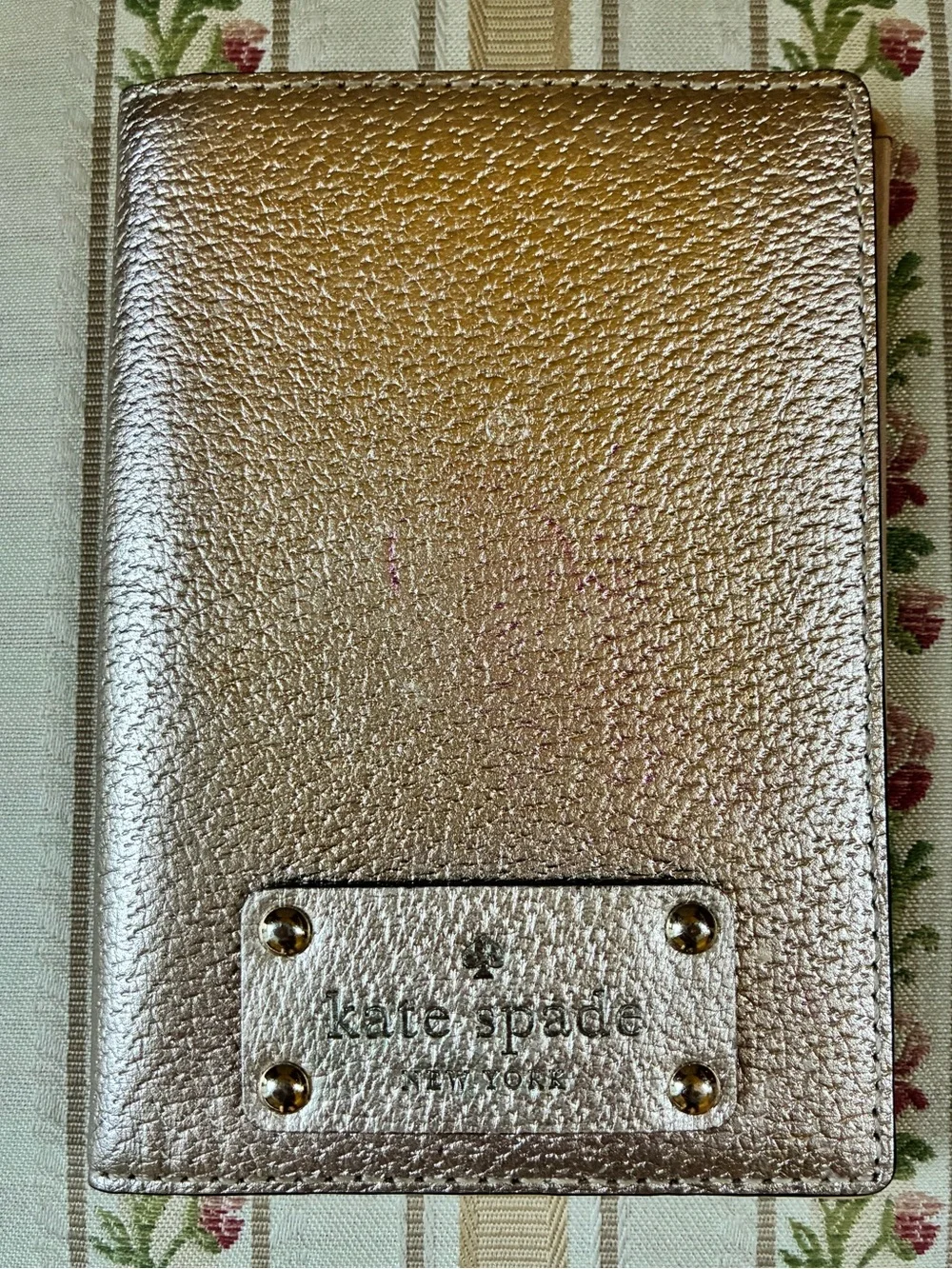 kate spade Metallic Rose Gold Pebbled Passport Cover
